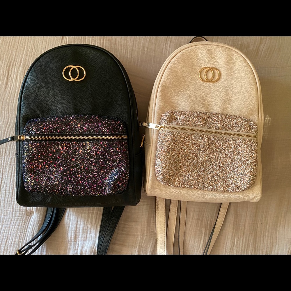 Aldo blush pink and black sparkly backpacks